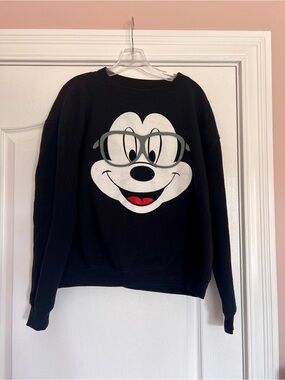 Disney Black Crewneck Sweatshirt with White Cartoon Face and Red Accent
